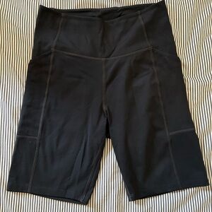 Girlfriend Collective black bike shorts with pockets